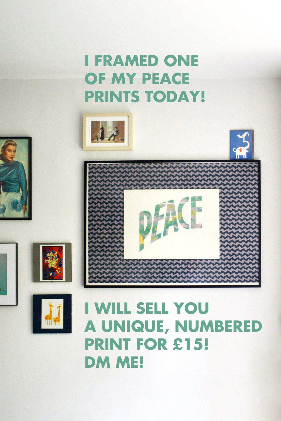 Picture of one of my peace screenprints in a frame on my wall